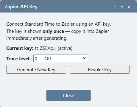 Zapier API Key dialog showing the current key, a trace level dropdown, and Generate New Key and Revoke Key buttons
